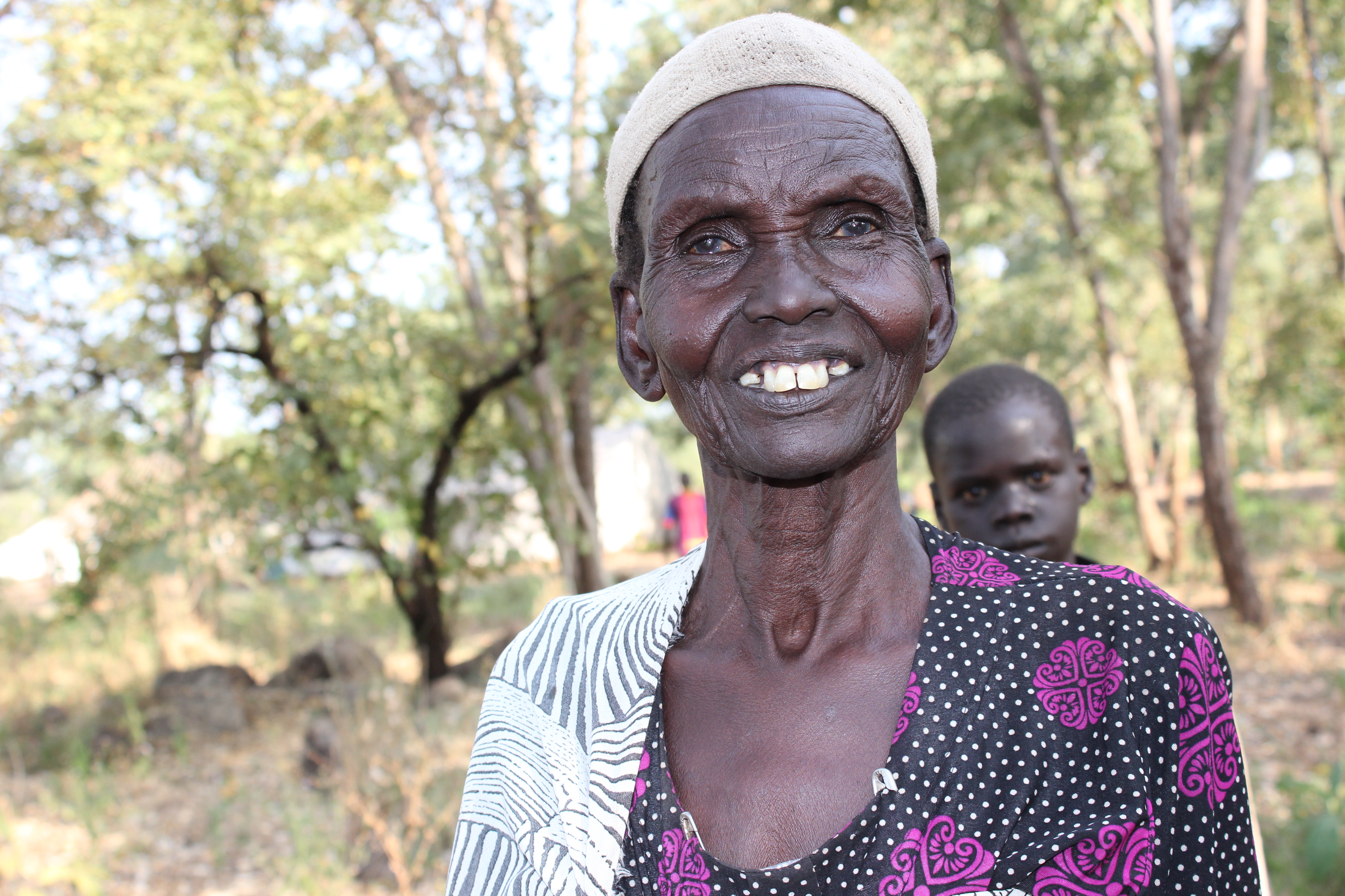 Nyanhial from South Sudan smiles at the camera.
