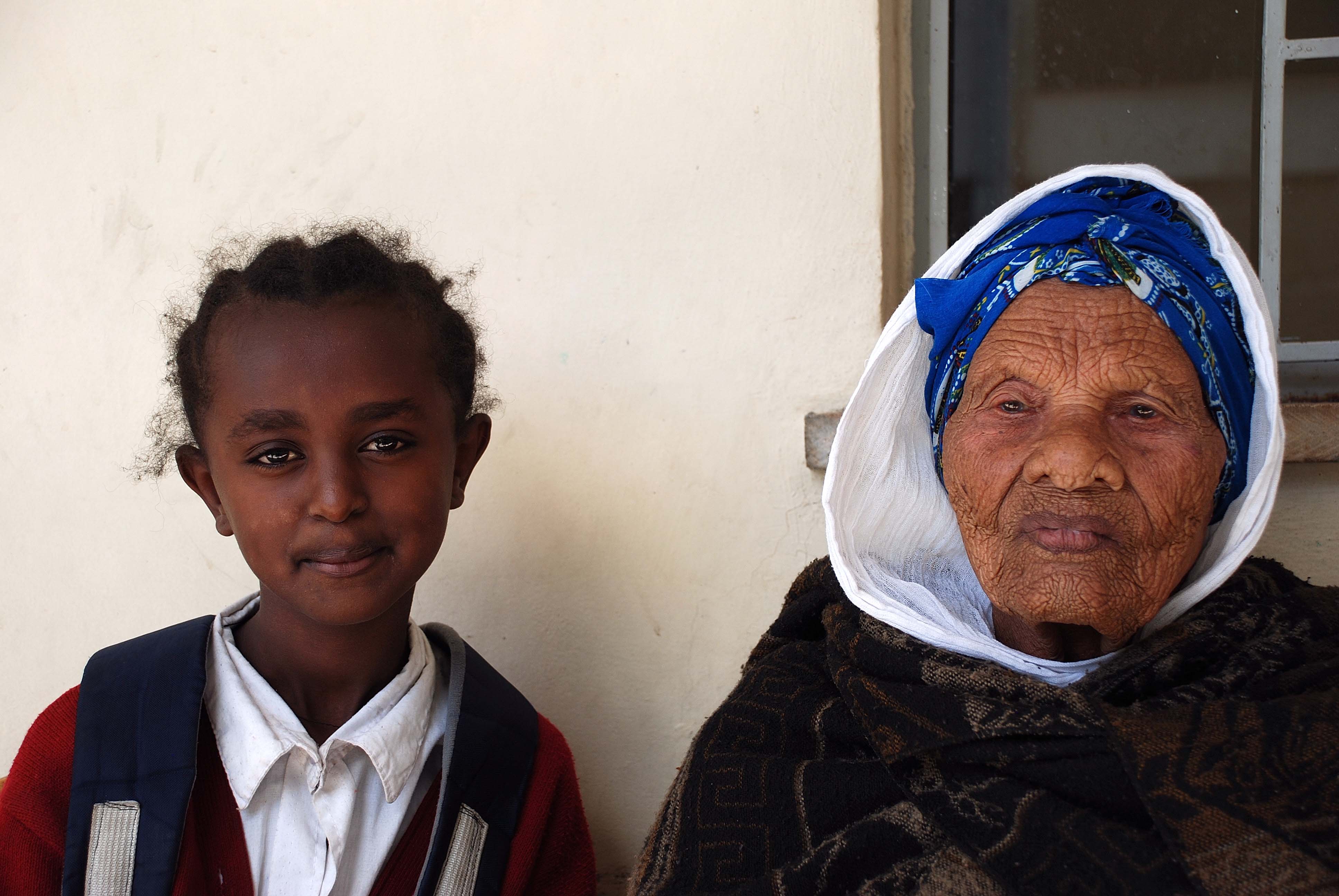 An older Ethiopian woman and her daughter.